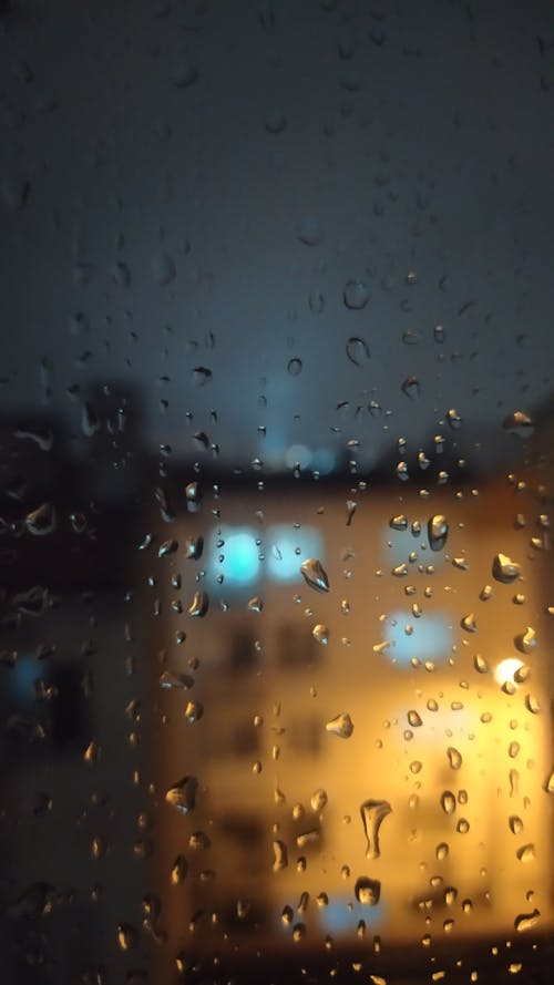 Raindrops on Window at Night