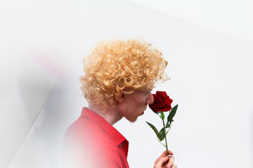 Man Holding Red Rose