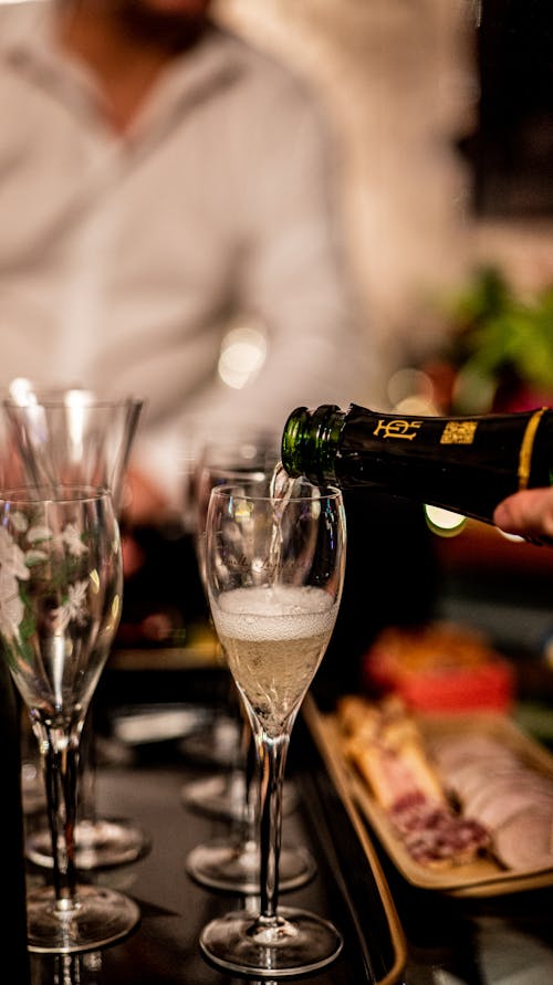 Foto profissional grátis de álcool, celebração, champagne