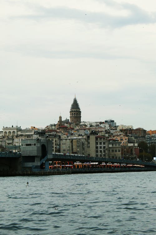 View of the Galata Bridge and Galata Tower from the Bosphorus Strait in Istanbul Turkey 
