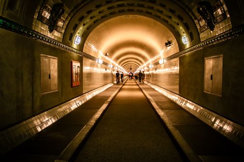 Free Historic Elbtunnel in Hamburg with bright lights and symmetrical architecture. Stock Photo