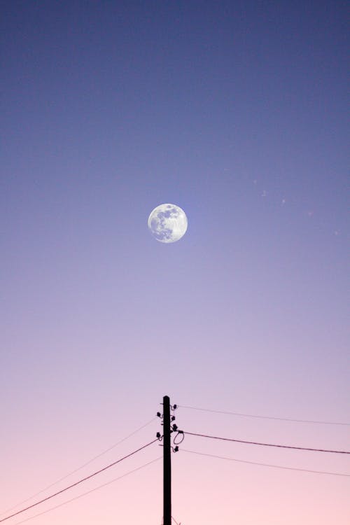 The Moon Above a Utility Pole