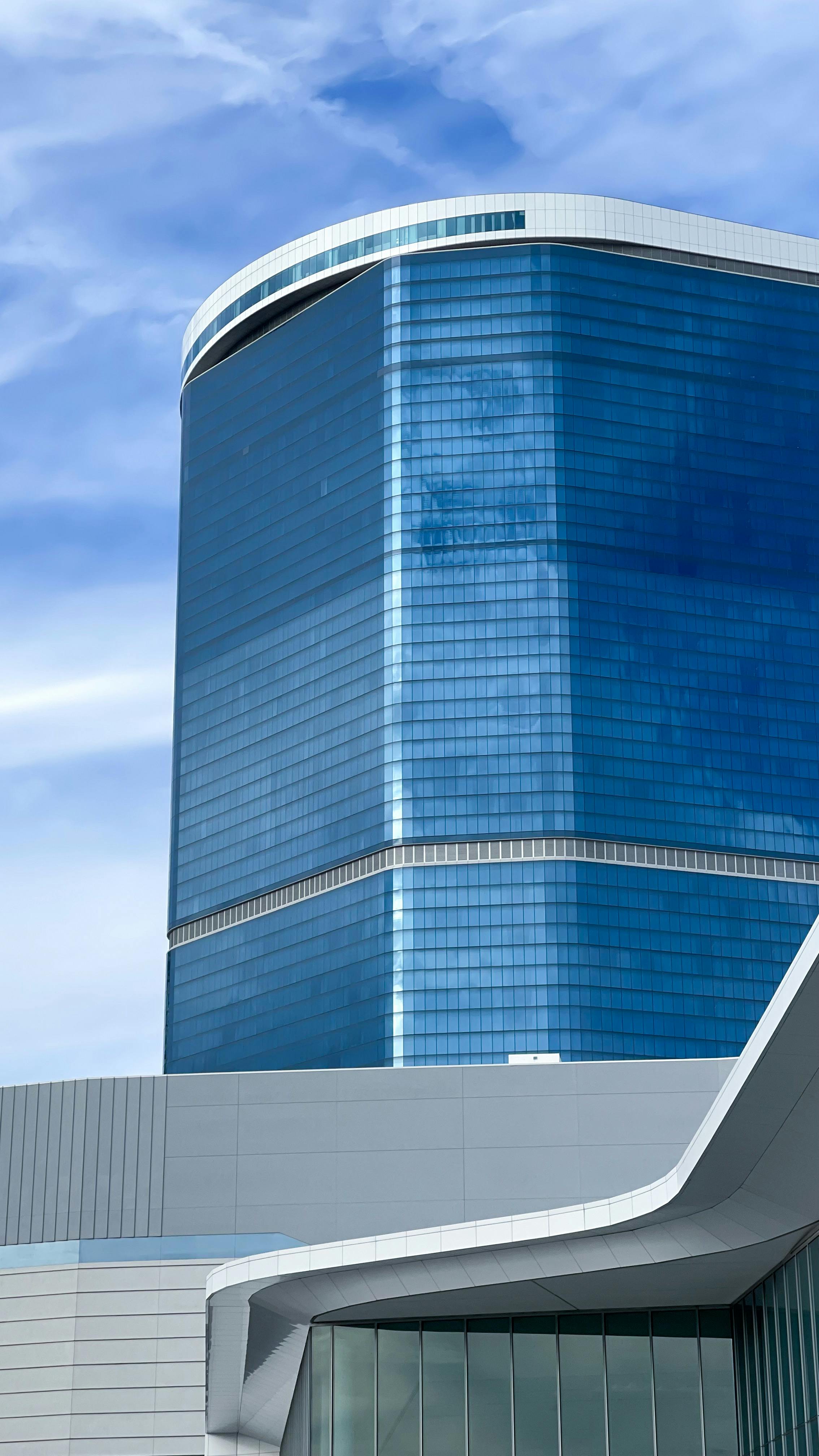 A striking modern skyscraper in Las Vegas against a clear blue sky.