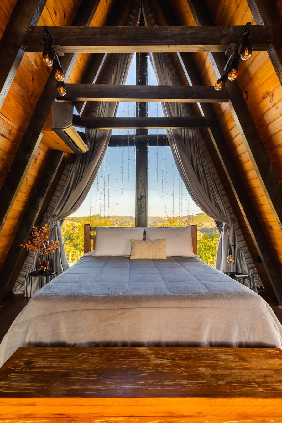 Cabin bedroom with forest view