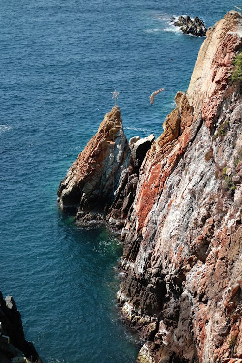 Безкоштовне стокове фото на тему «берег моря, вертикальні постріл, еродований»