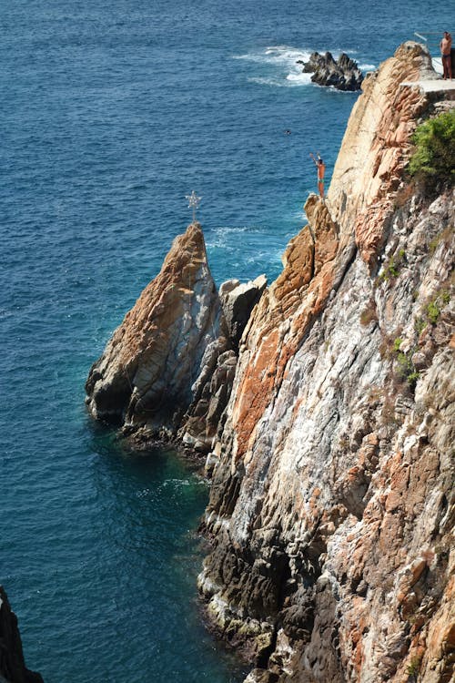Eroded Cliff along Blue Sea