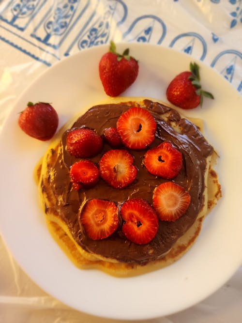 Free Pancake with Strawberries and Chocolate Cream Stock Photo