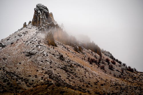 Fog over Hill with Rocks