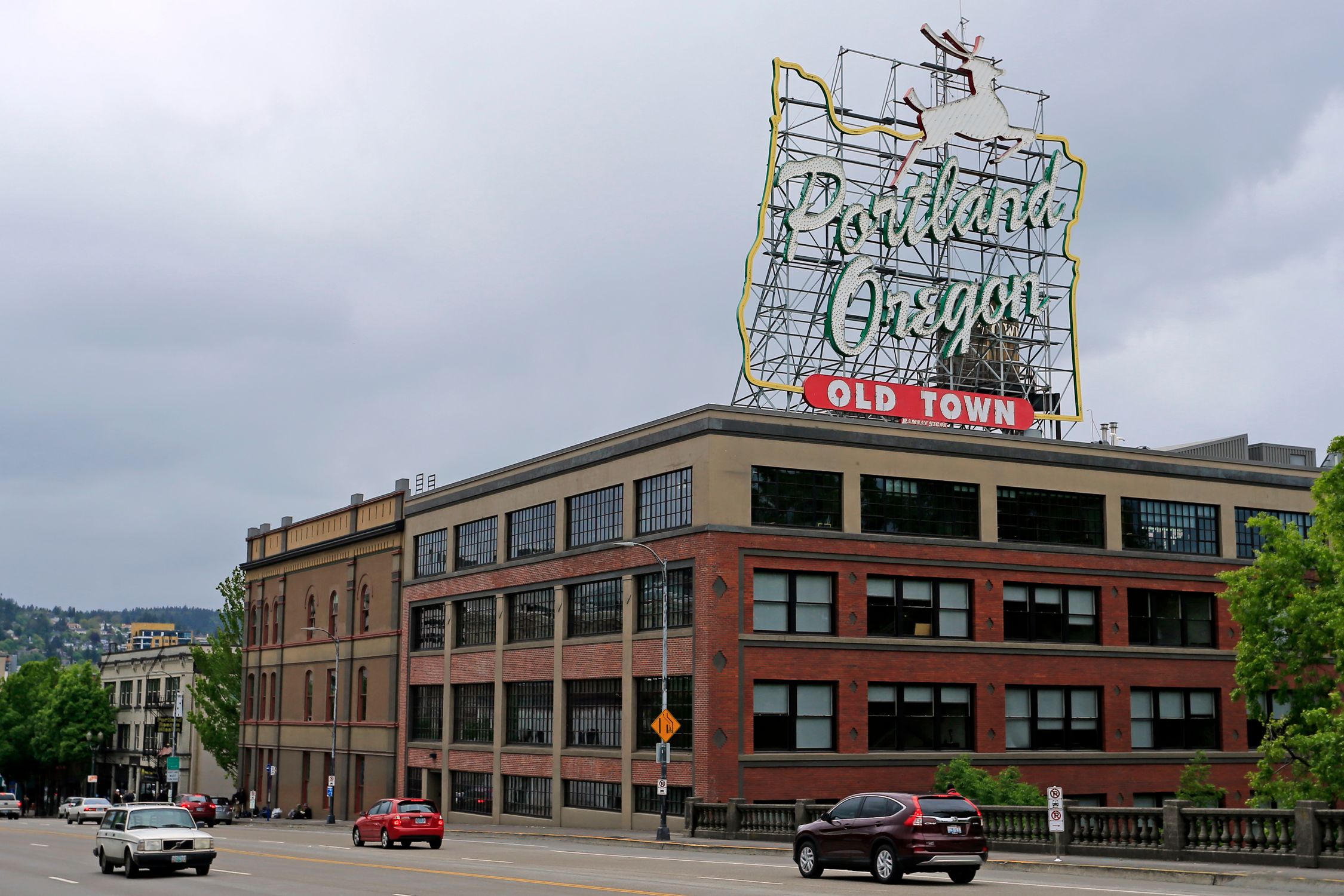 Famous Portland Oregon Old Town sign, capturing urban architecture and city vibe.