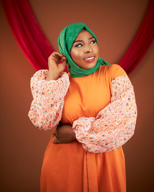 Foto stok gratis fotografi mode, gaun oranye, jilbab