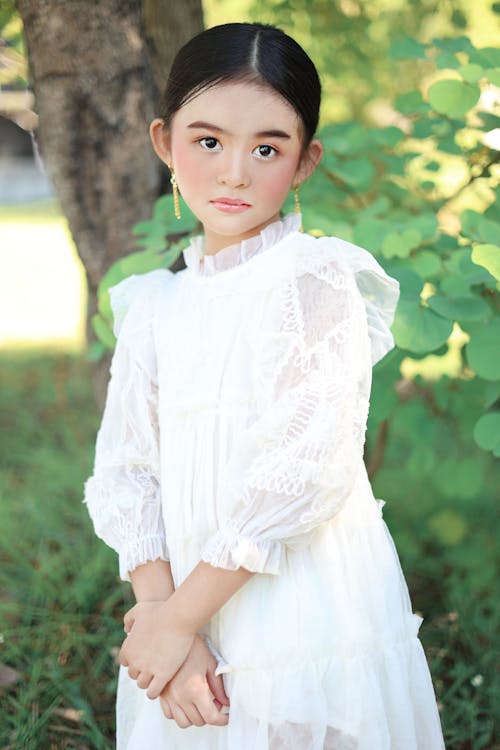 Portrait of Girl in White Dress