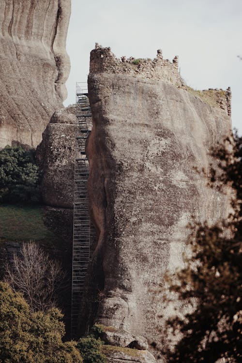 A High Rock Formation with Stairs Leading to an Observation Point 