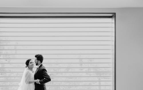 Wedding Couple by the Window in Black and White 