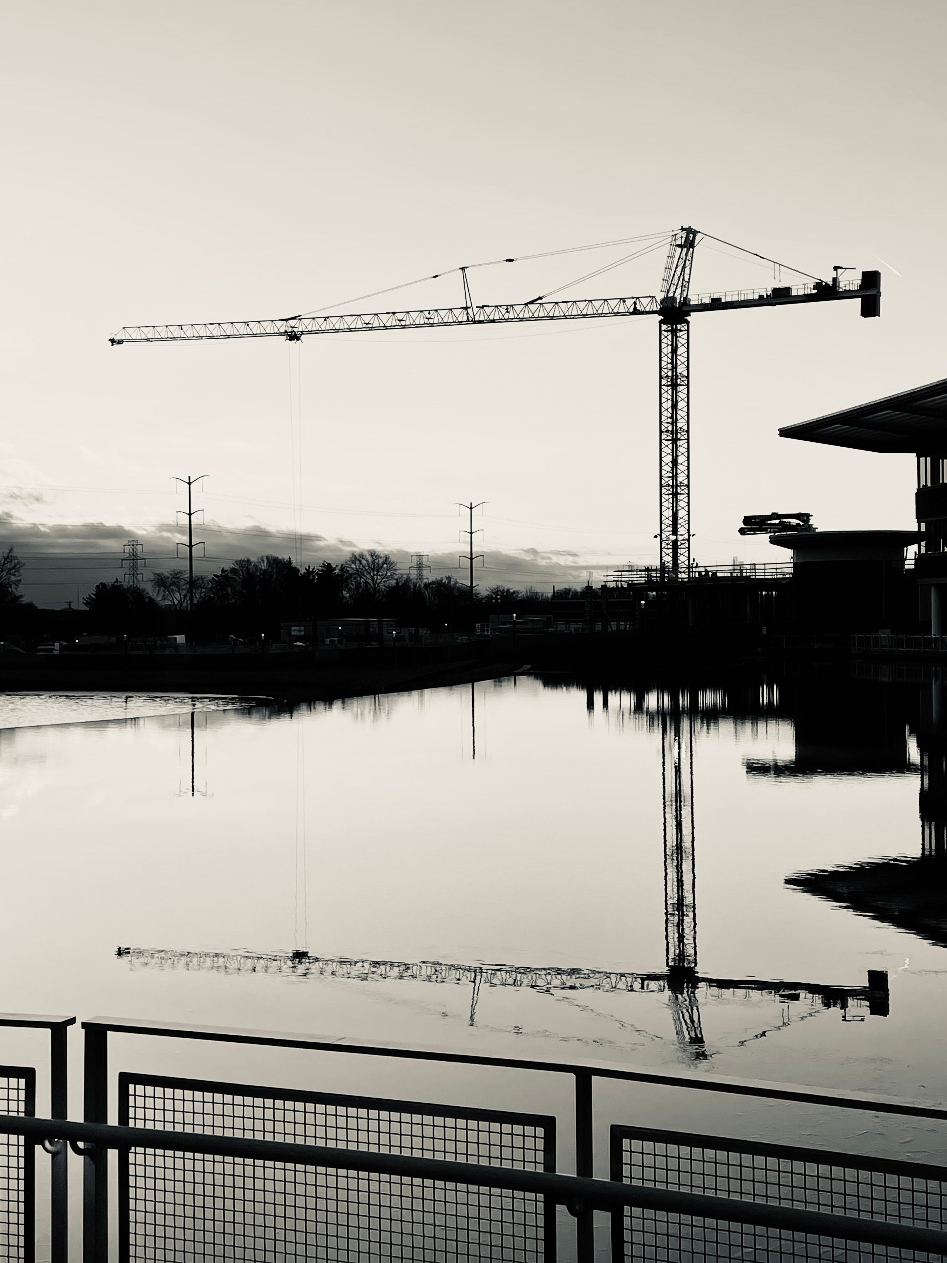 Crane in a Harbor in Black and White · Free Stock Photo