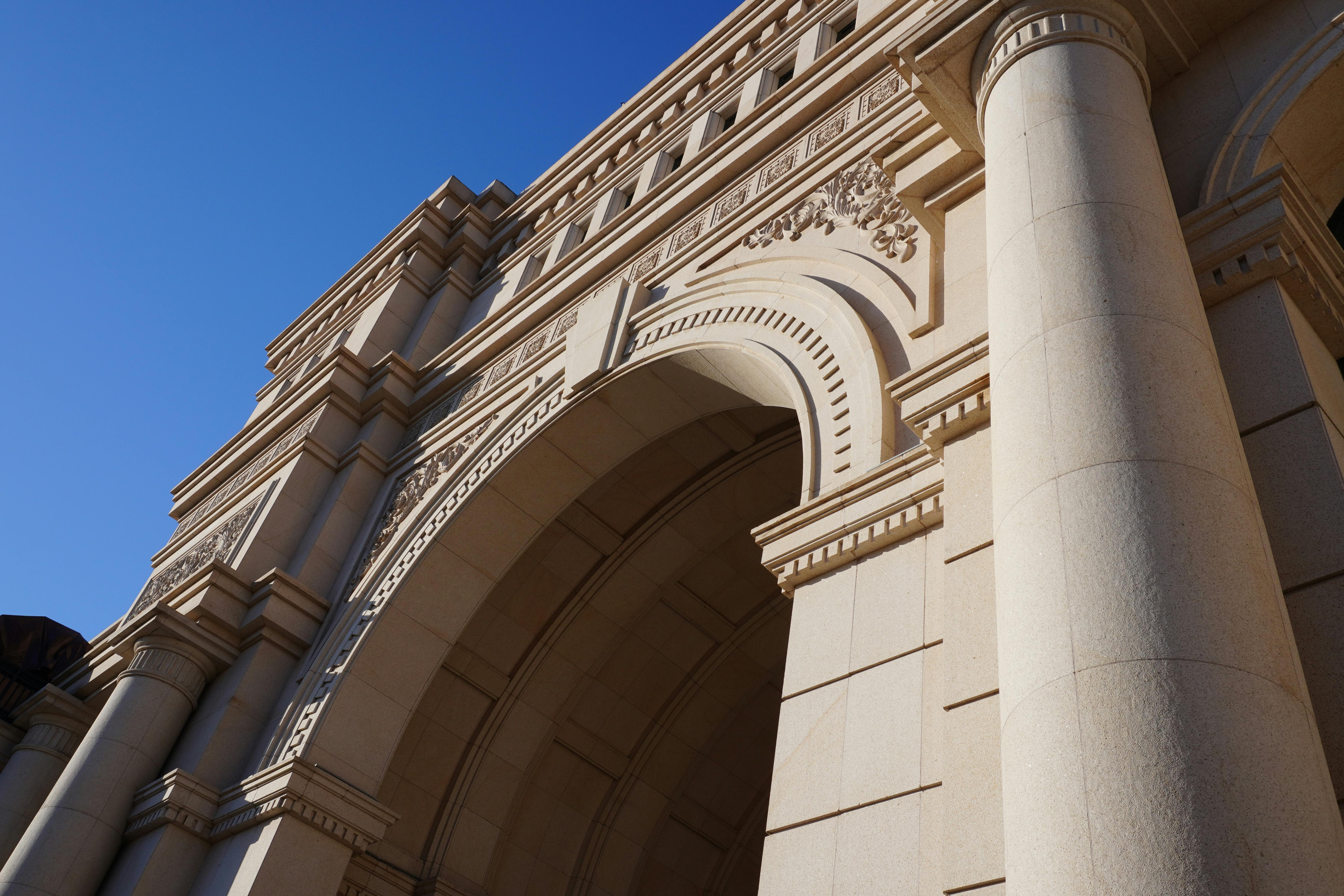 A stunning architectural facade of Minyuan Stadium in Tianjin, showcasing elegant marble details.