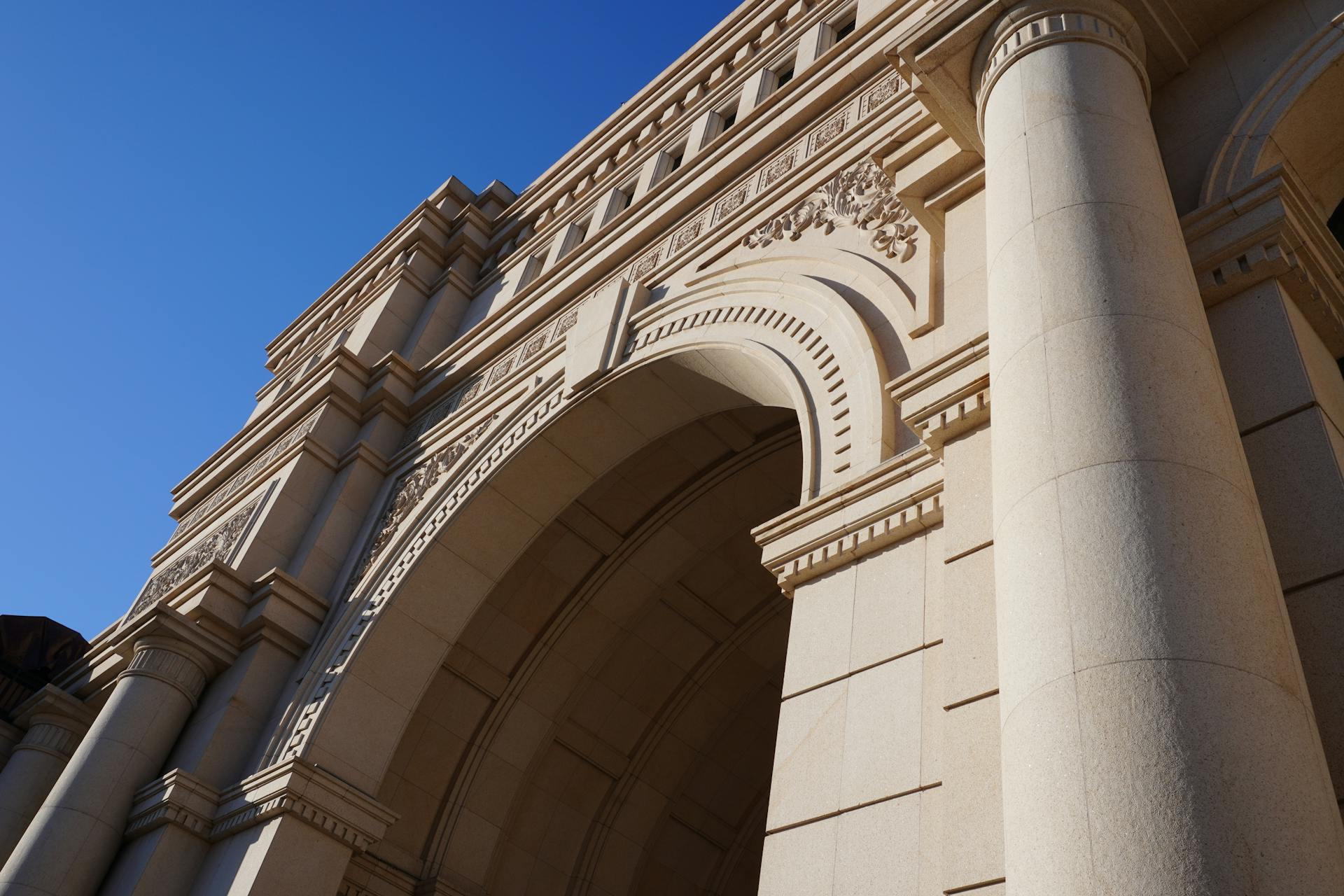 A stunning architectural facade of Minyuan Stadium in Tianjin, showcasing elegant marble details.