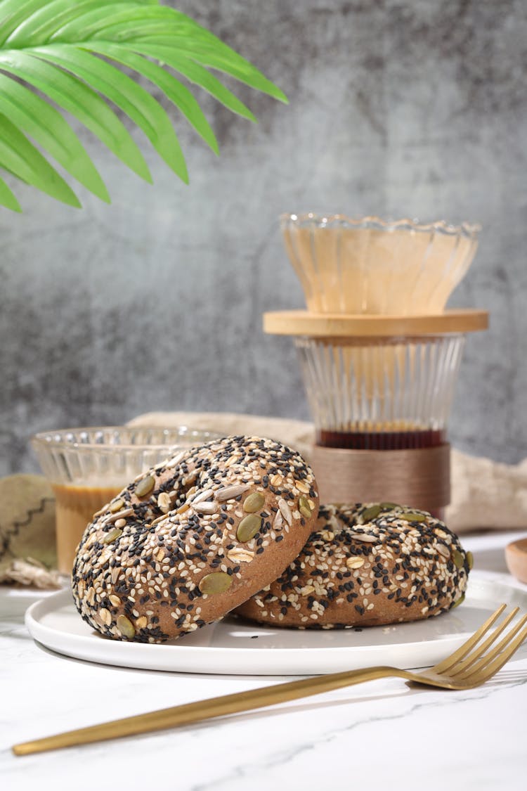 Rustic Bagels With Seeds On Plate