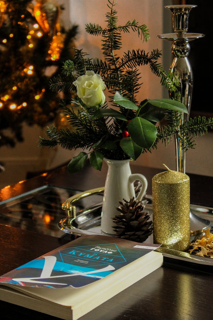 Book And Flower On Table