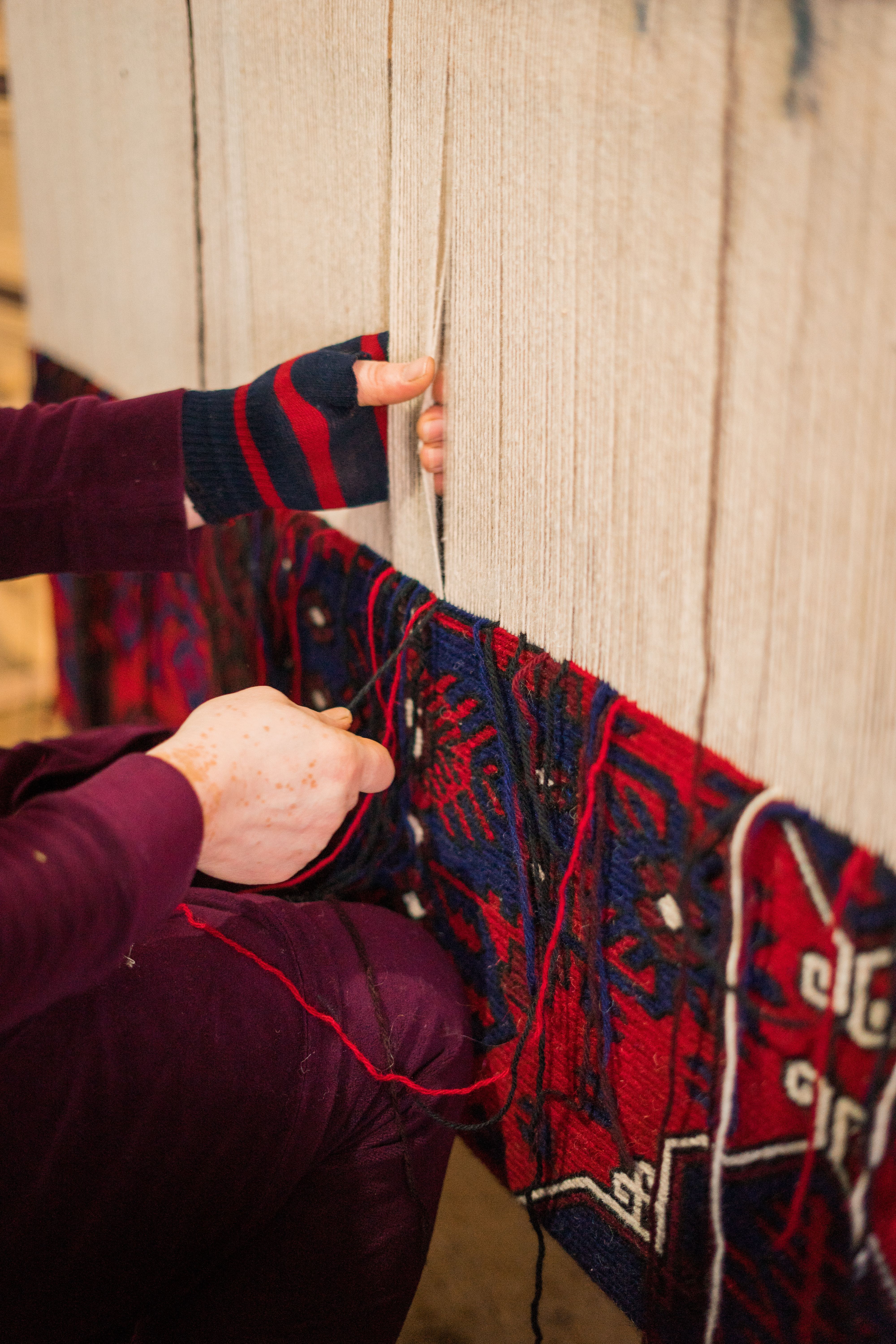 Woman Making Colorful Carpet · Free Stock Photo