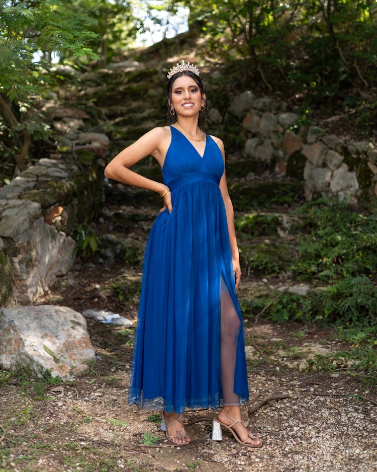 Model In Crown And Blue Dress