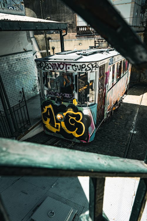Graffiti on Tram in Narrow Alley 
