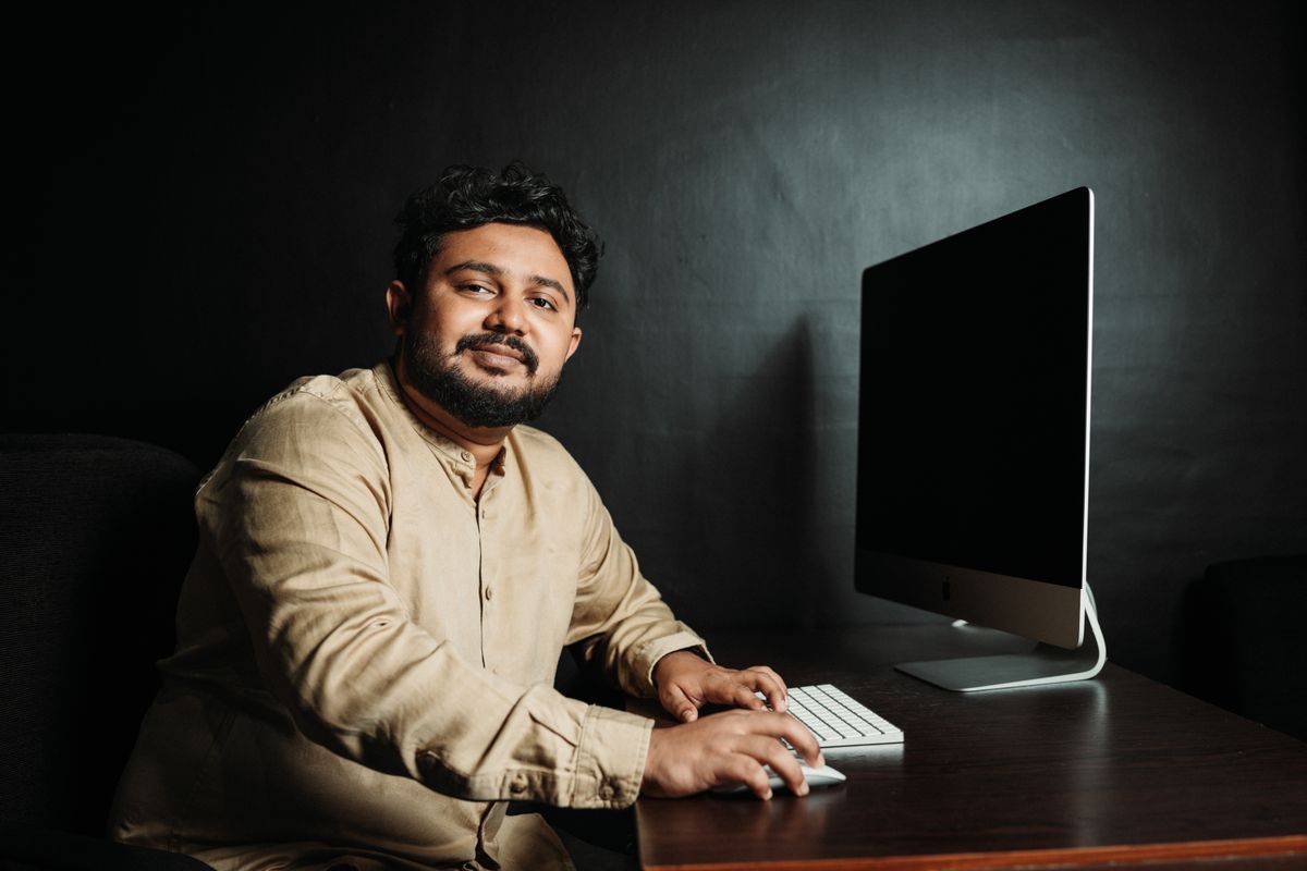 Portrait of a man working at a desk