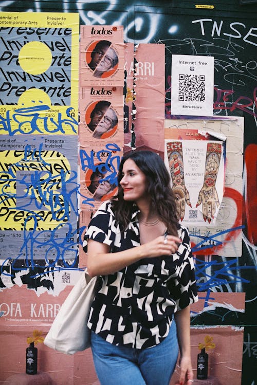 Smiling Woman Standing with Bag