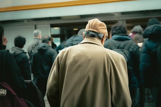 Man in Beige Coat and Beige Ivy Cap