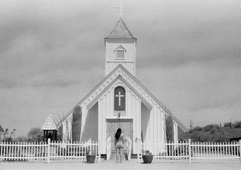 Woman Looking at Elvis Presley Memorial Chapel
