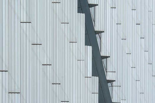Abstract view of a modern building facade with minimalist pattern and geometric design.