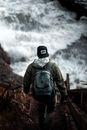 Man Carrying Backpack While Going Down