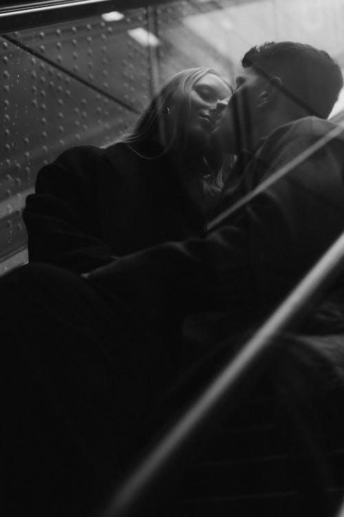 Portrait of Couple on an Escalator in Black and White 