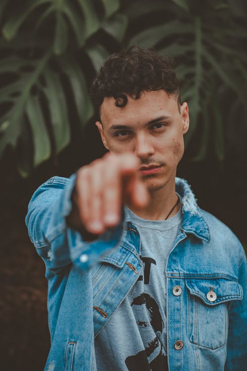 Man in Blue Denim Jacket in Low Saturation Photography