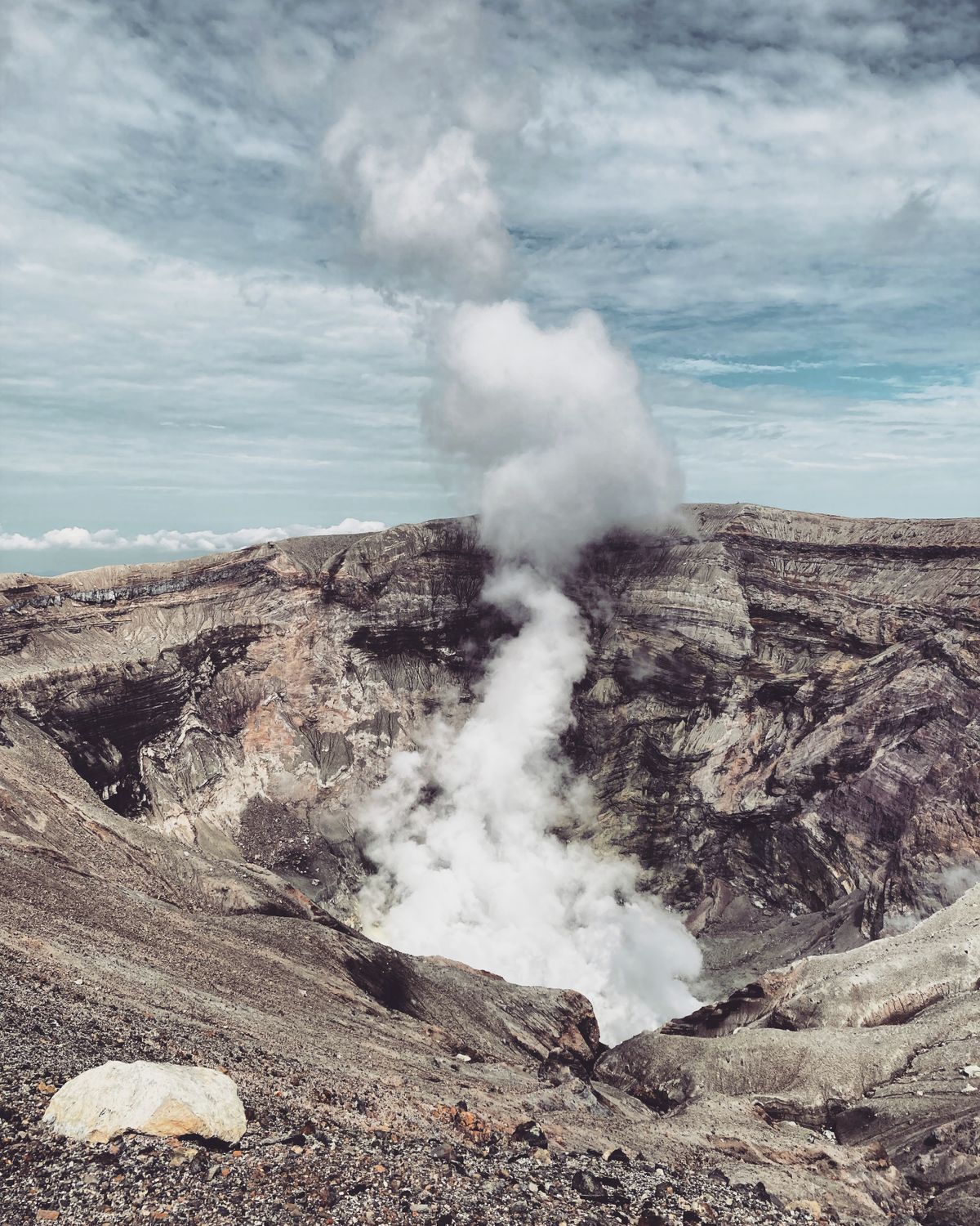 Mount Aso Nakadake crater with active steam venting — the volcanic landscape that gives Kumamoto its most distinctive character
