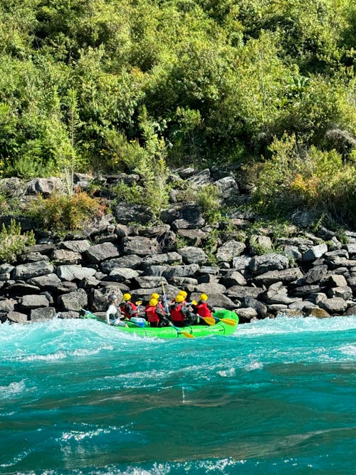 Rafting Down a Rapid River in an Inflatable Boat