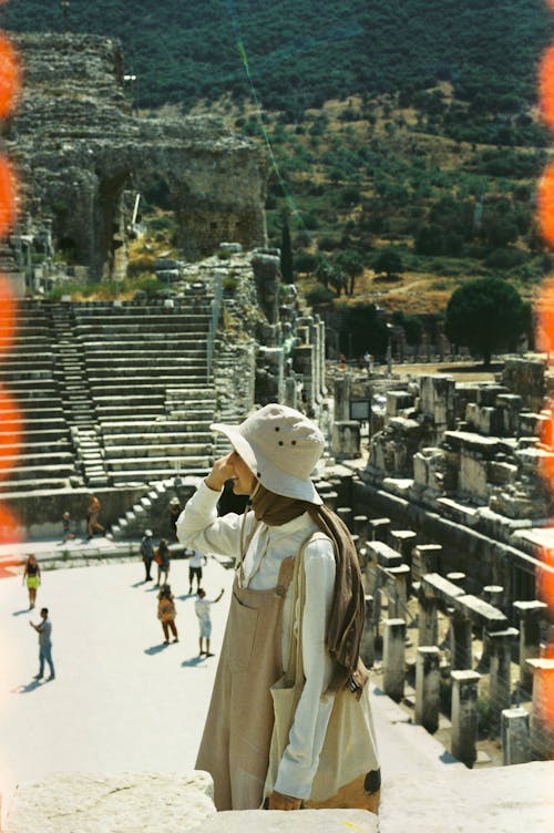 Tourist Visiting the Ruins of the Roman Amphitheatre