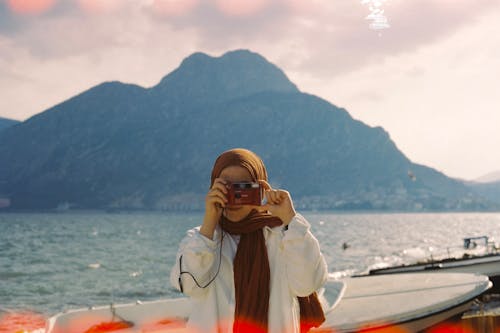 Free Woman in Hijab Taking Photo Stock Photo