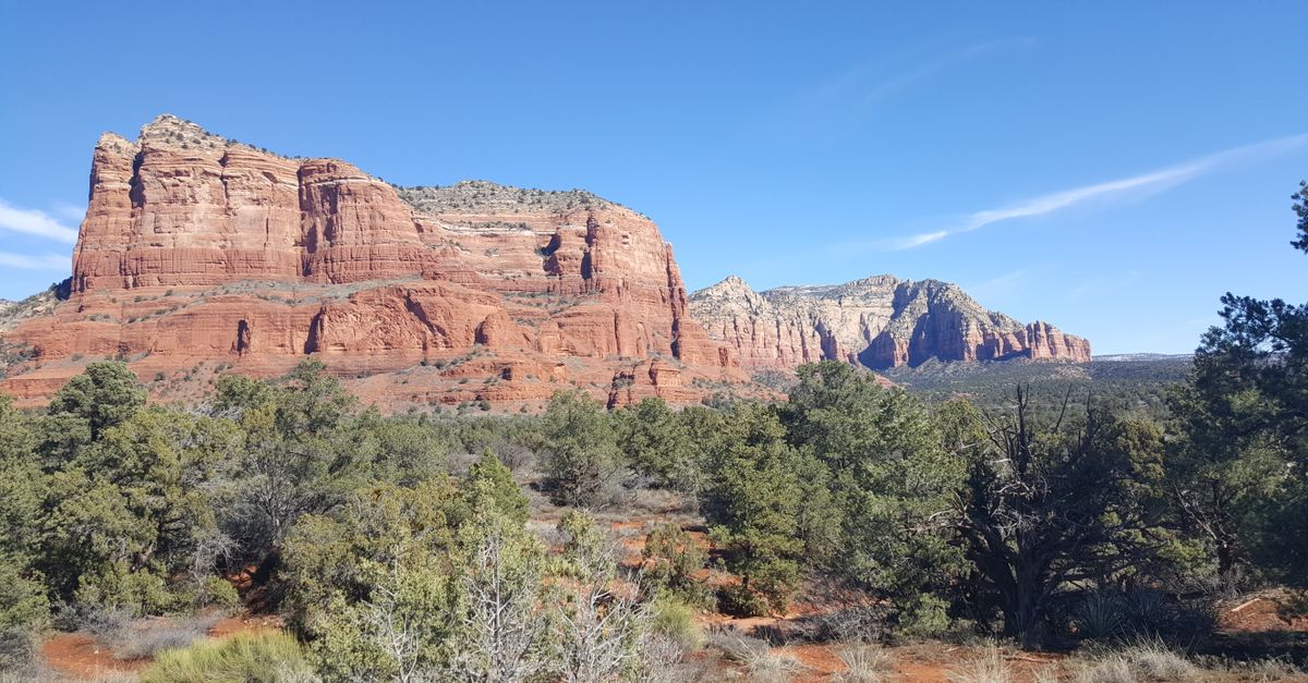 Stunning red rock formations in Sedona, Arizona under a clear blue sky.