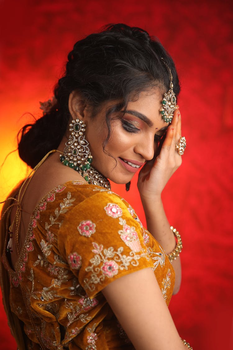 Pretty Woman In Orange Dress With Jewellery