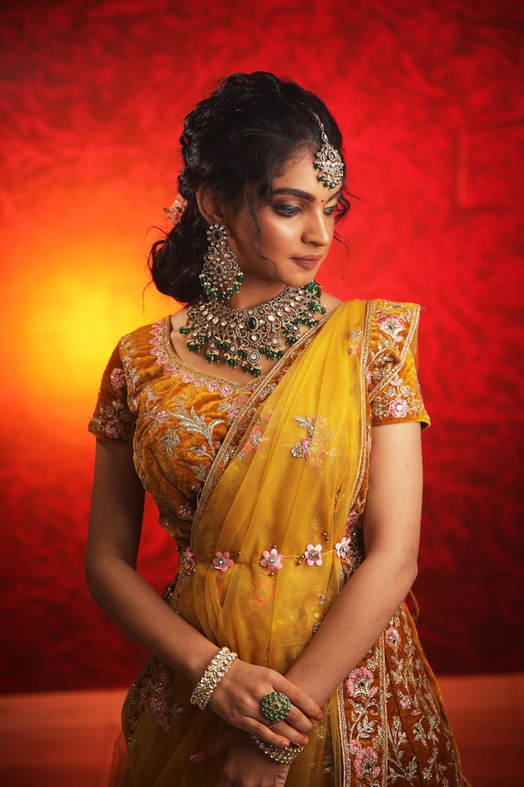 Brunette Woman In Traditional Jewellery And Dress