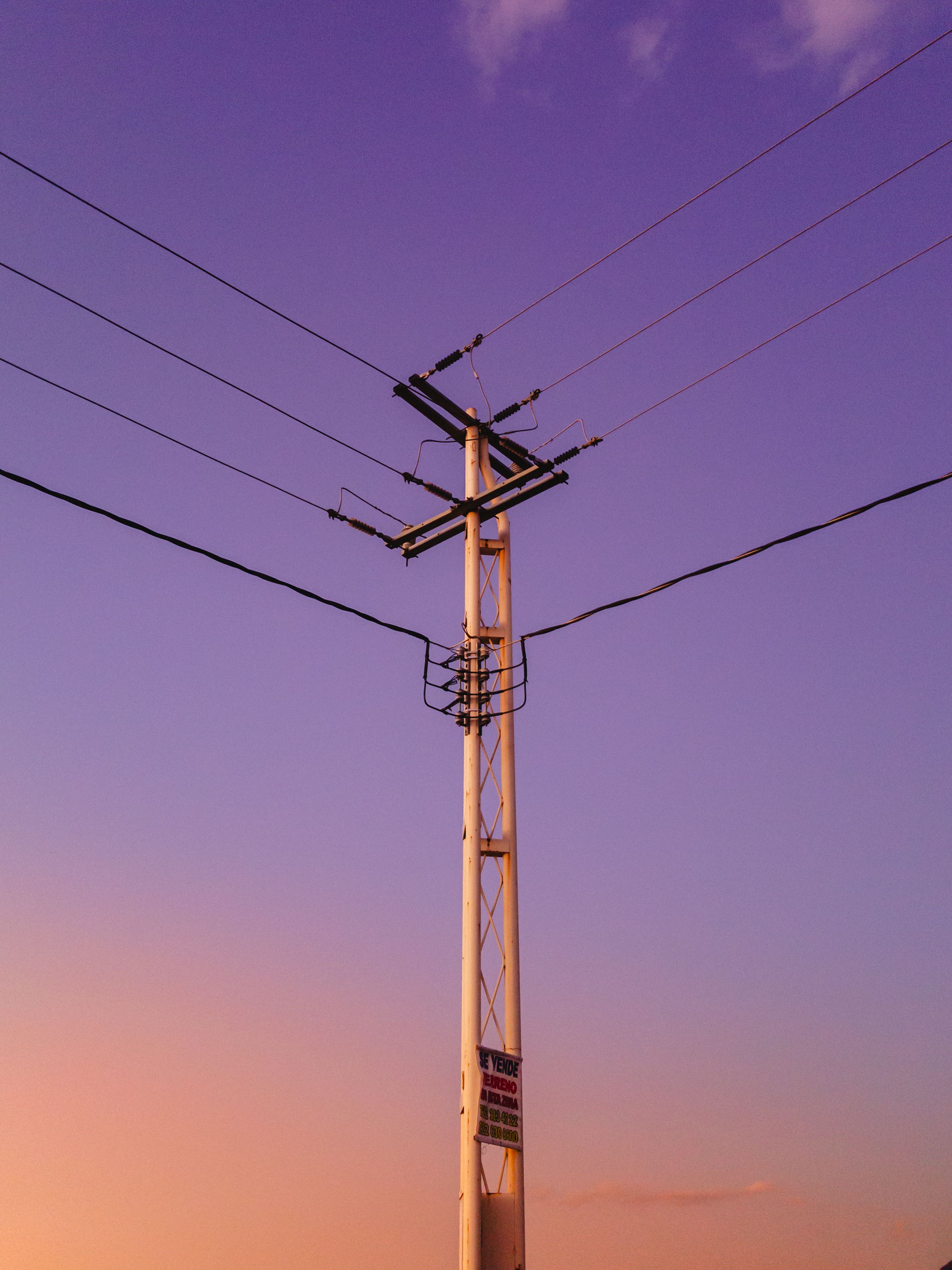 Low Angle Shot of an Electricity Pole at Sunset · Free Stock Photo