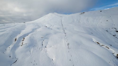 Snowy Mountain with a Ski Lift