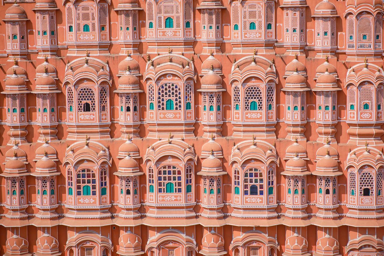The pink sandstone facade of Hawa Mahal up close