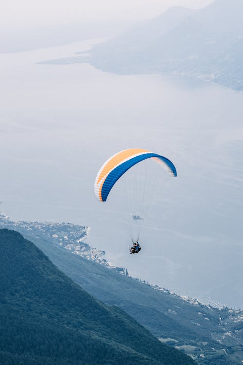 Man on a Parachute by the Coast 
