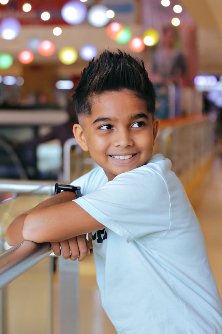 Portrait Of A Boy Looking Over His Shoulder 