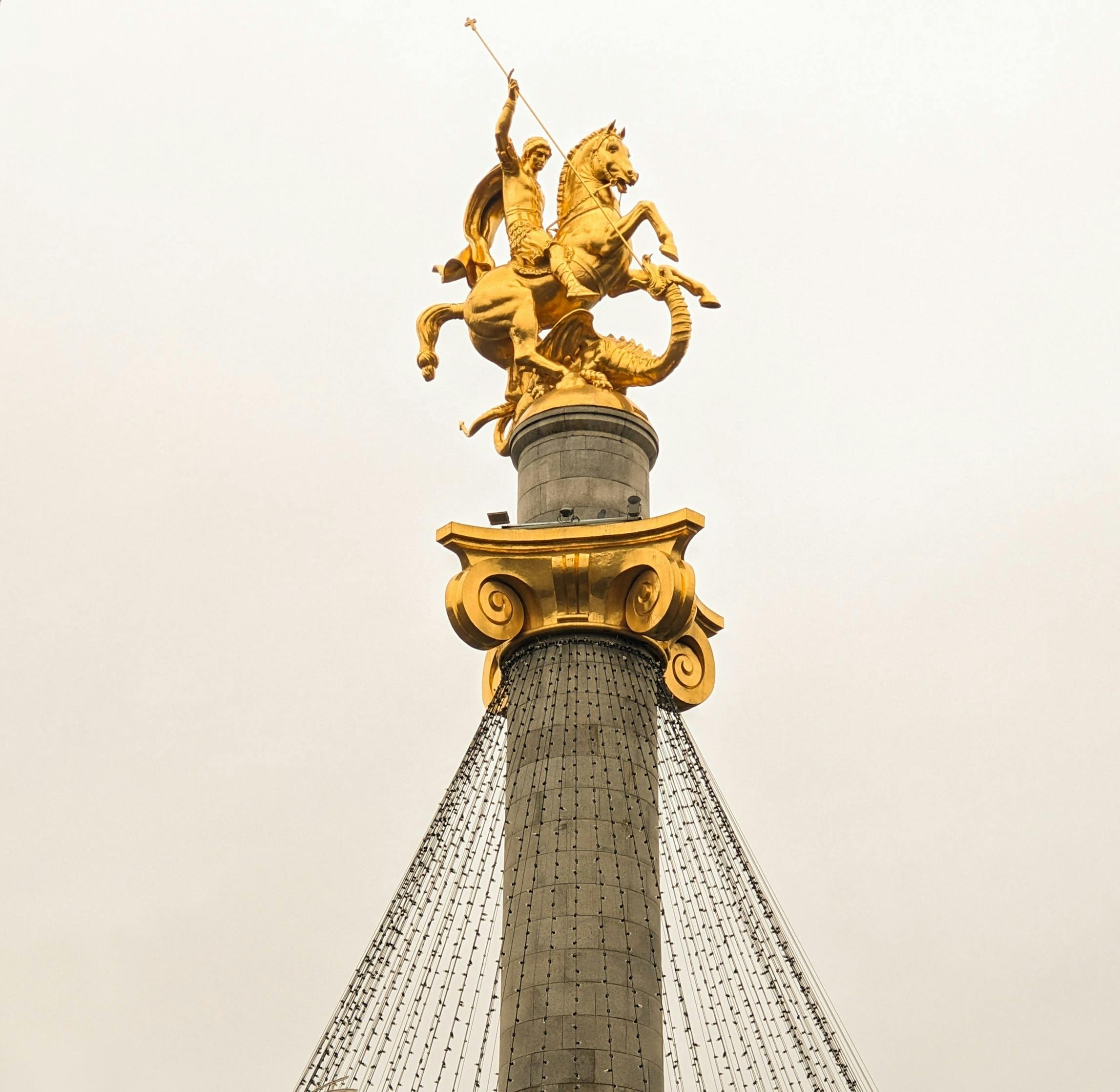 golden monument of saint george in tbilisi georgia