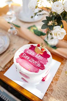 A beautifully decorated cake with flowers, perfect for celebrations.