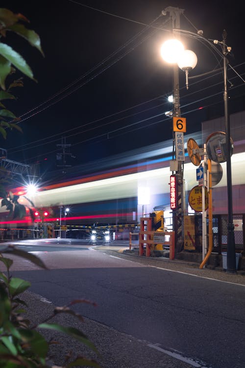 Level Crossing on Road at Night