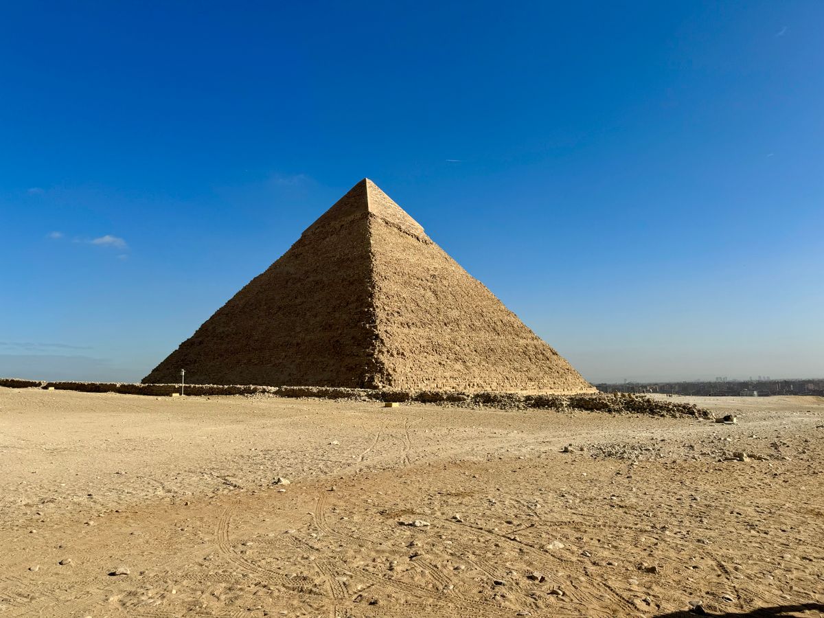 Pyramid Loading Man Taking Photo of the Great Pyramid · Free Stock Photo