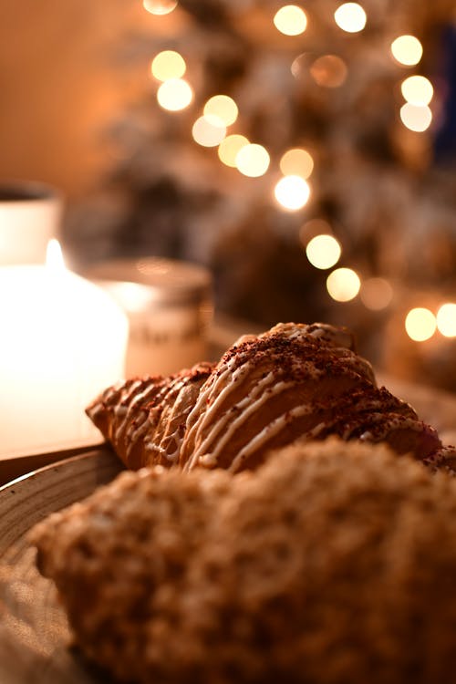 Close-up of Sweet Pastry on the Background of a Christmas Tree